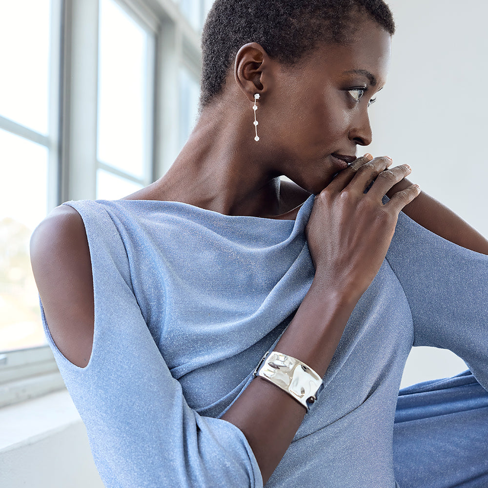 An image of a woman wearing fashion accessories by Montique